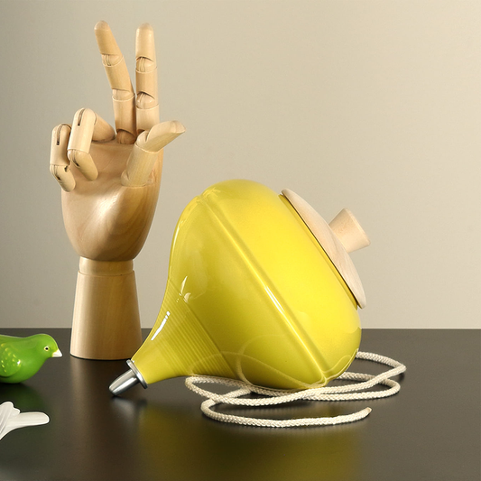 Yellow spinning top