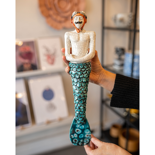 Gente com escamas · Tritão