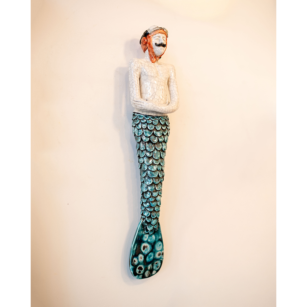 Gente com escamas · Tritão