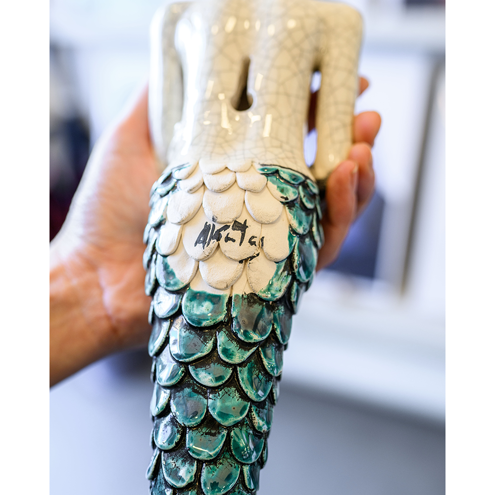 Gente com escamas · Tritão